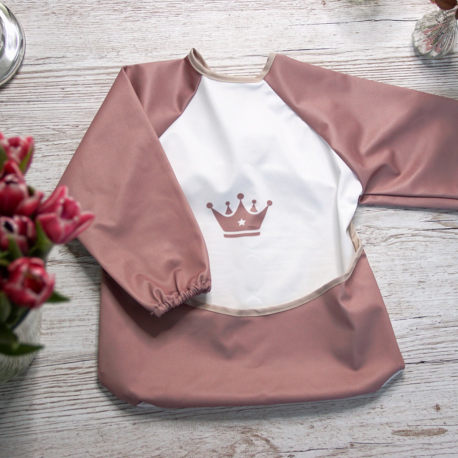 Soft bib pink with long sleeves (crown) incl. carry bag