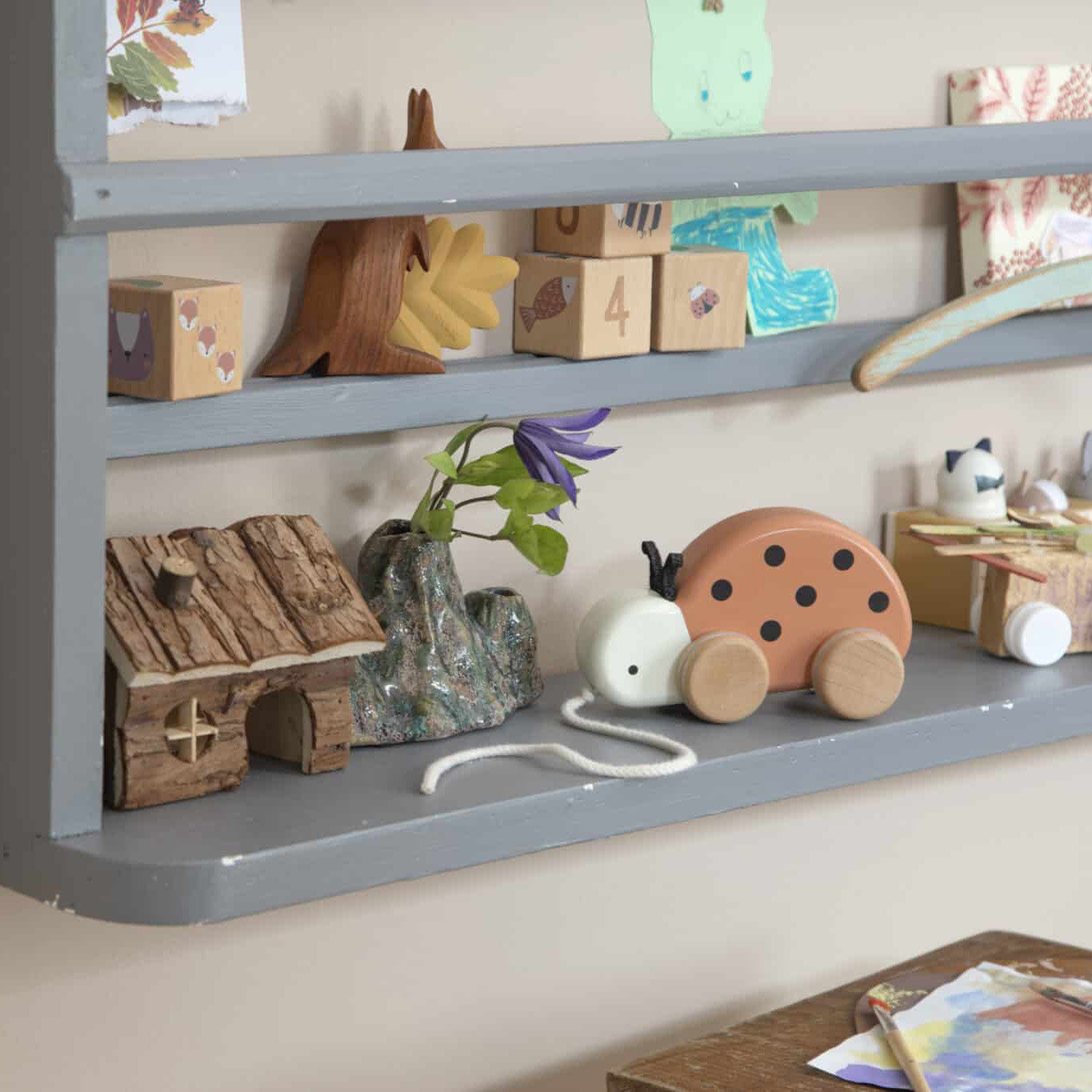 Luca the ladybug wooden pull-along toy Dark orange