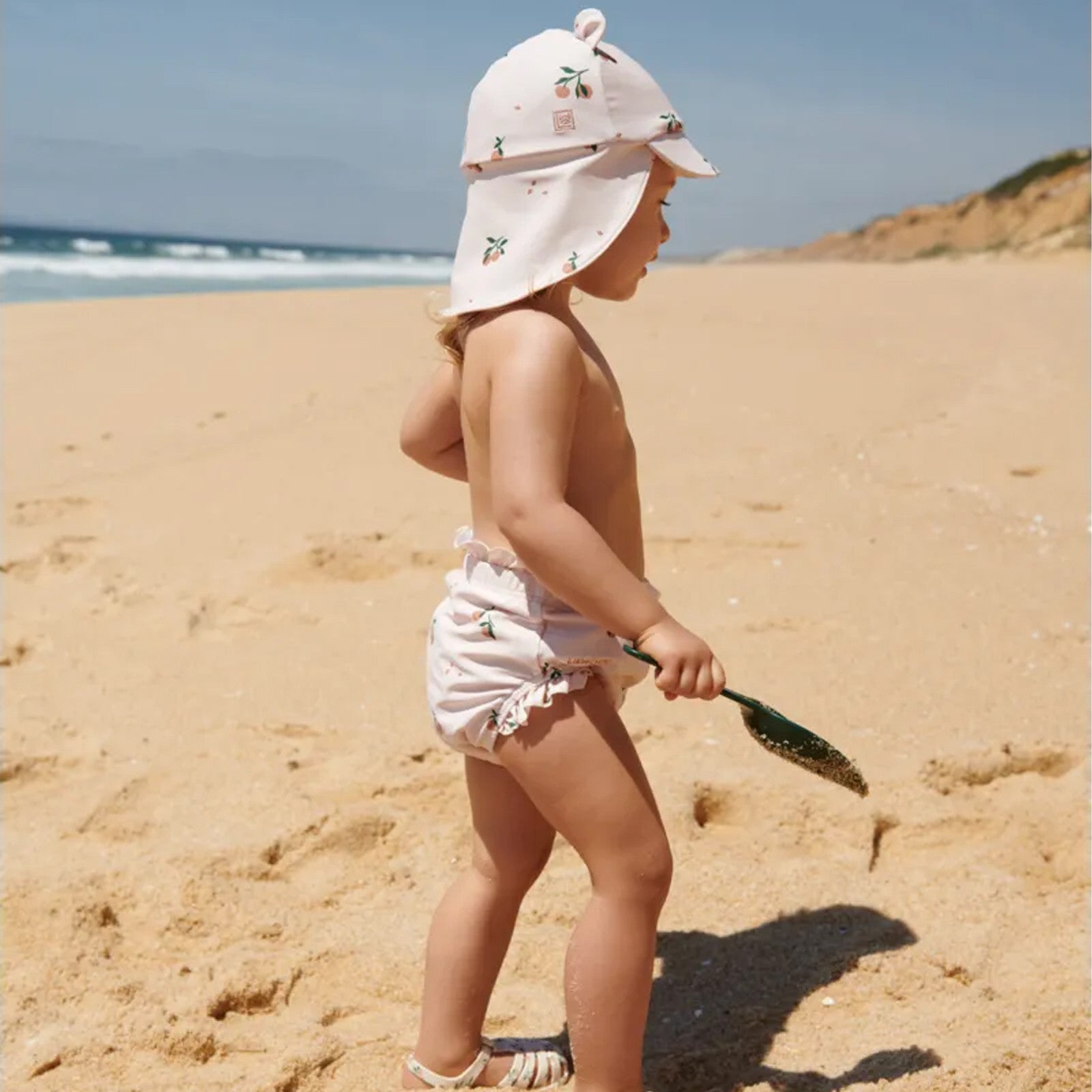 Manilla Peach Sea Shell baby swim trunks