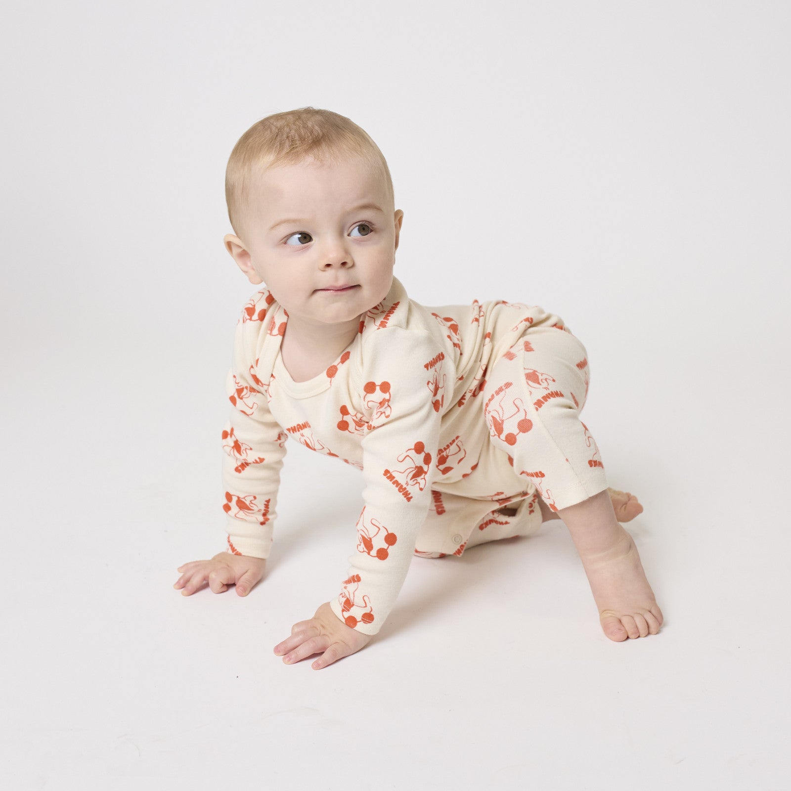 Combinaison bébé Rolling Dog blanc cassé