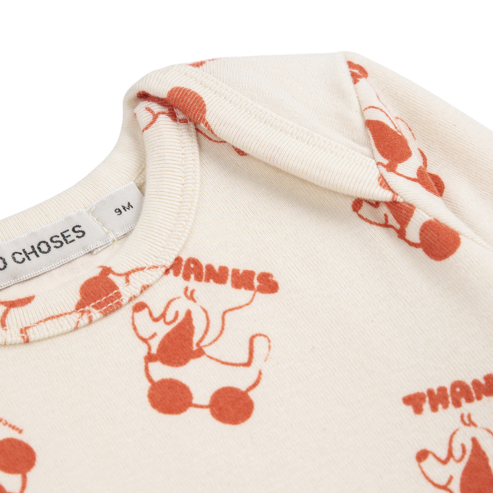 Combinaison bébé Rolling Dog blanc cassé