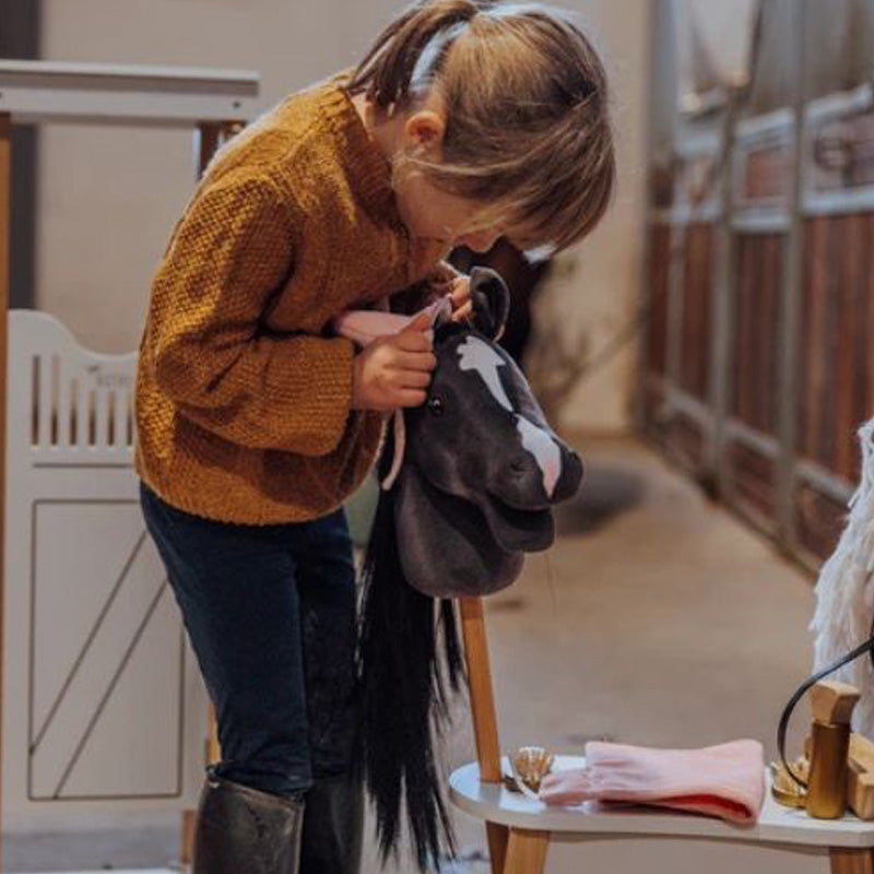 Saddle pad and hood for hobby horses in rose velvet