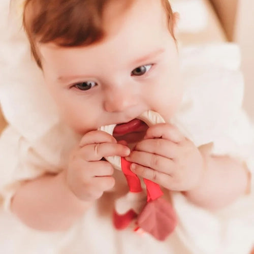 Anneau de dentition avec fleur