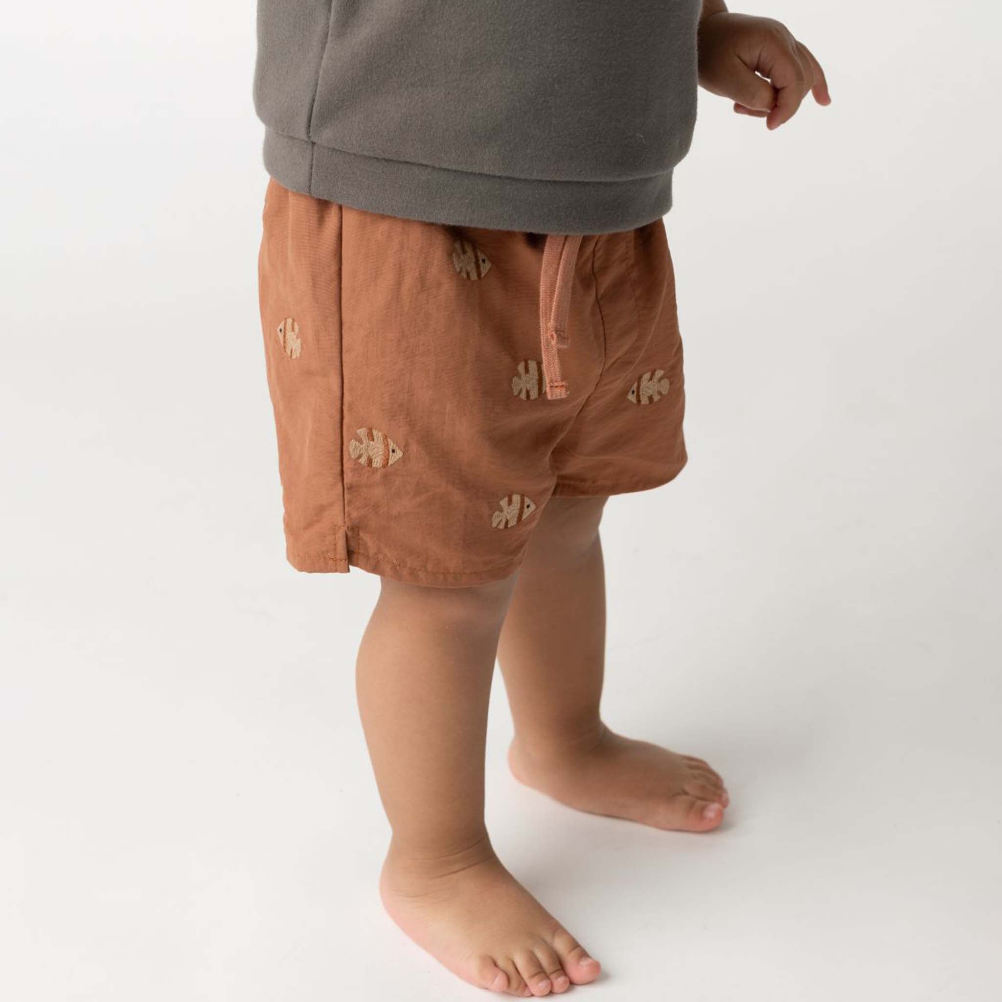 Wangu Moonfishes Rust swim trunks