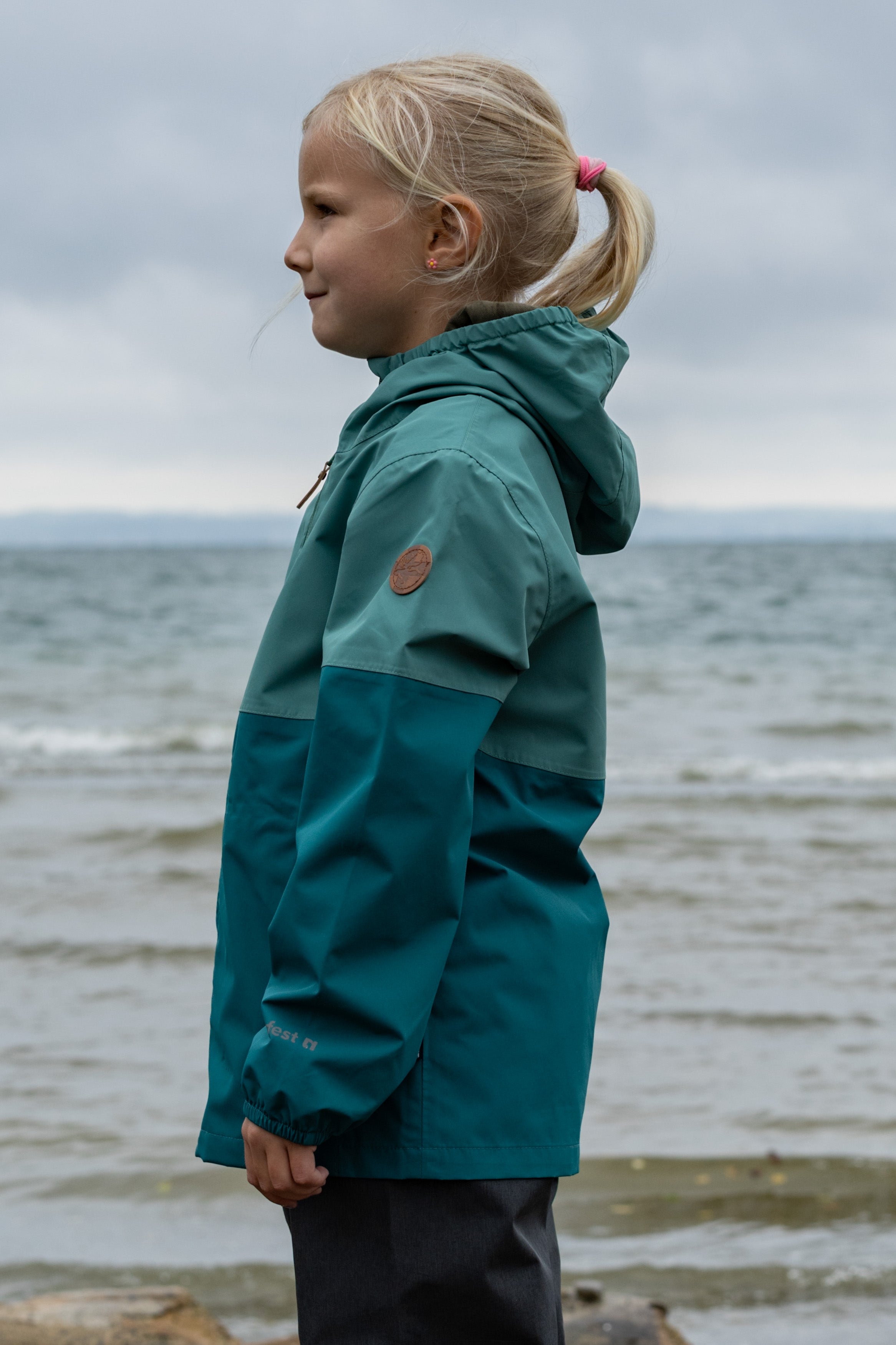 Travellight children's rain jacket deep sea