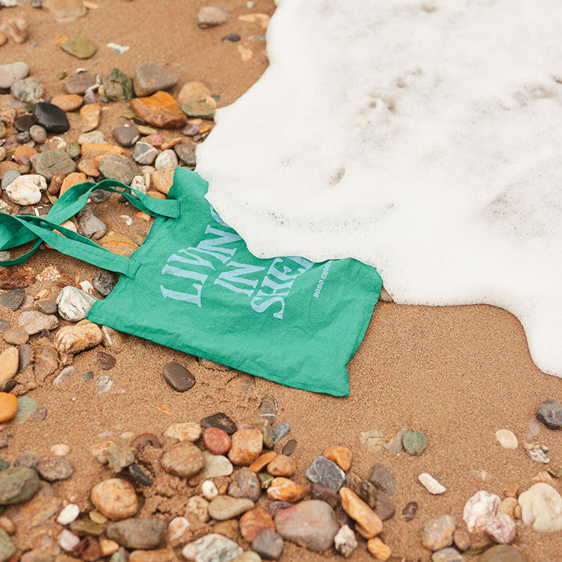 Living in a Shell green bag