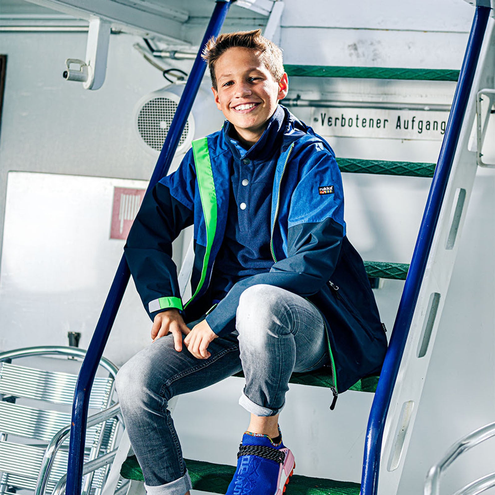 Kids Puck rain jacket peacock denim