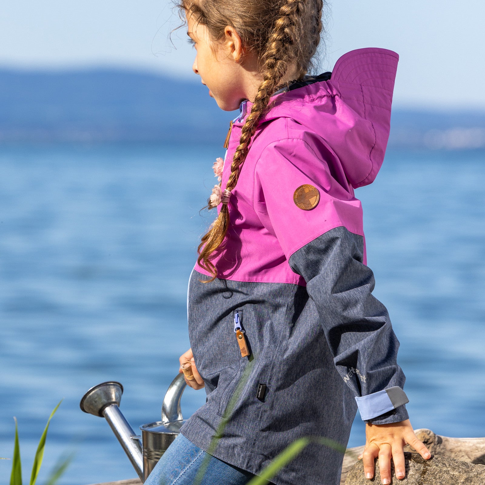 Kids Puck rain jacket radiant orchid