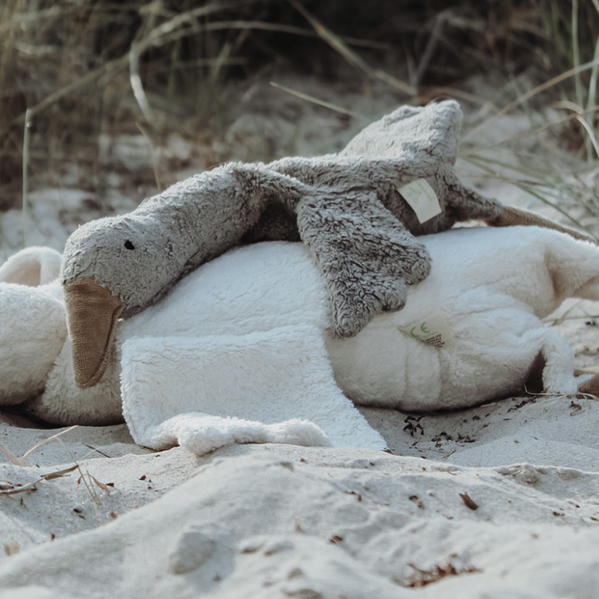 Senger organic cuddly and warming toy goose cherry stone small gray