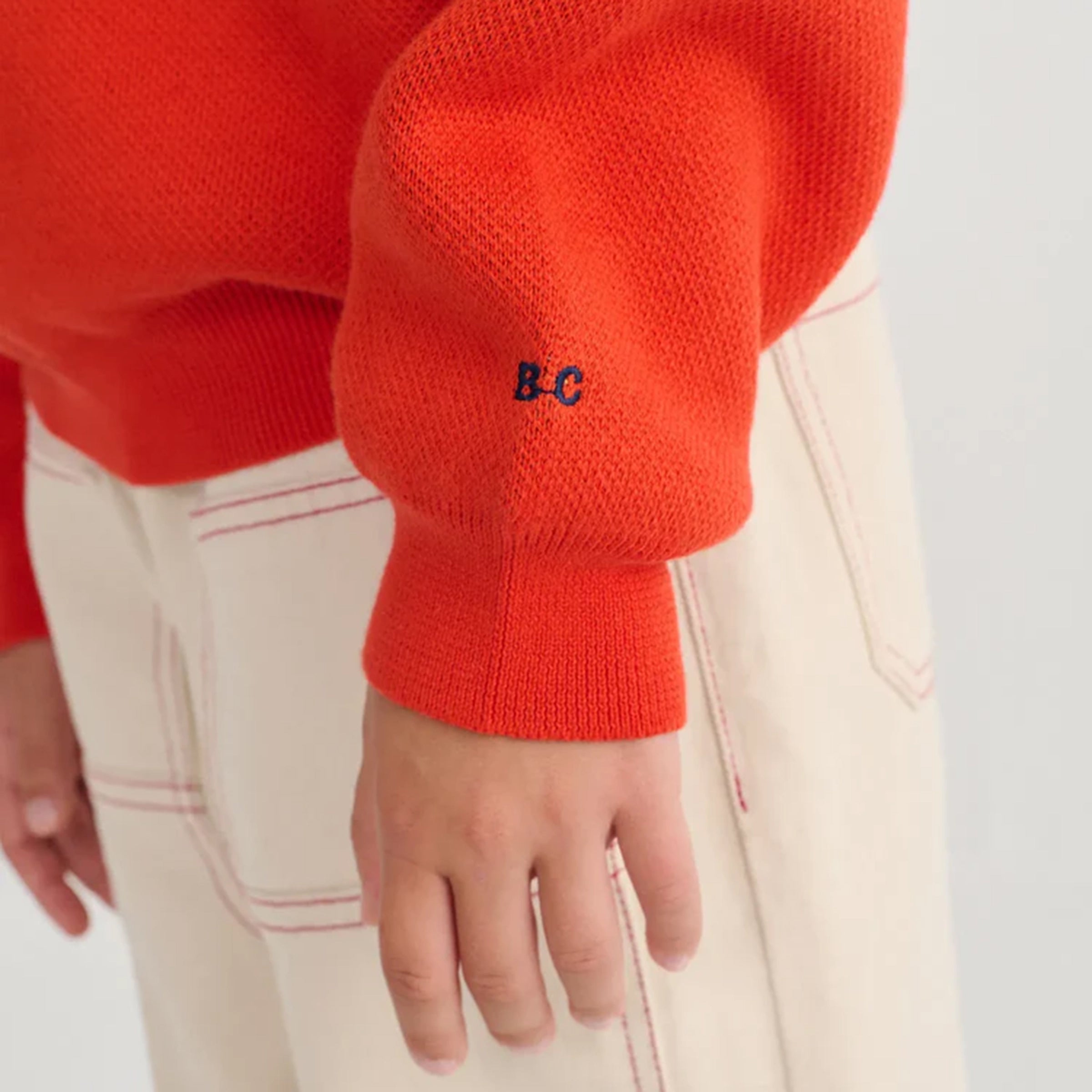 Pull ferme aventure rouge