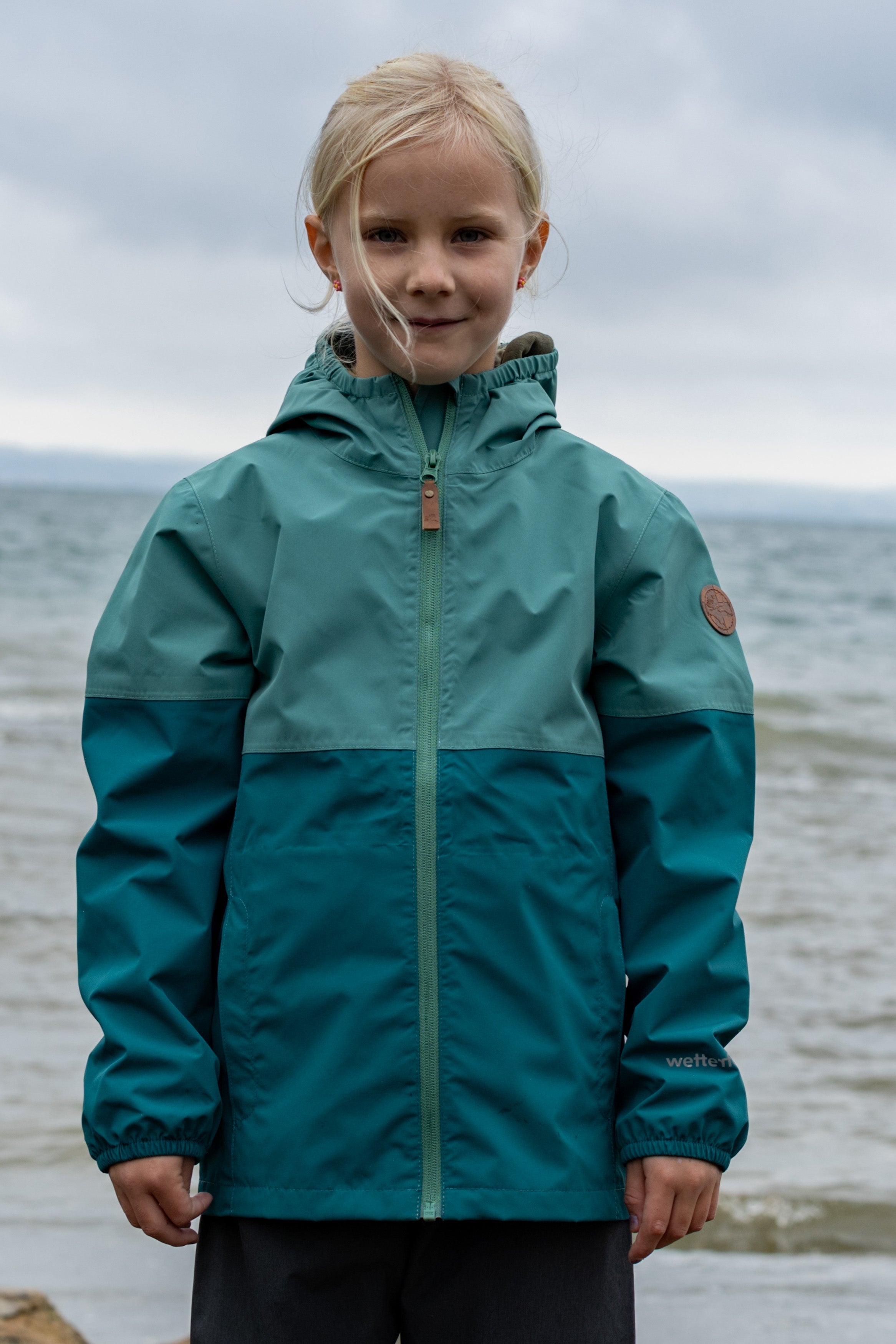 Travellight children's rain jacket deep sea