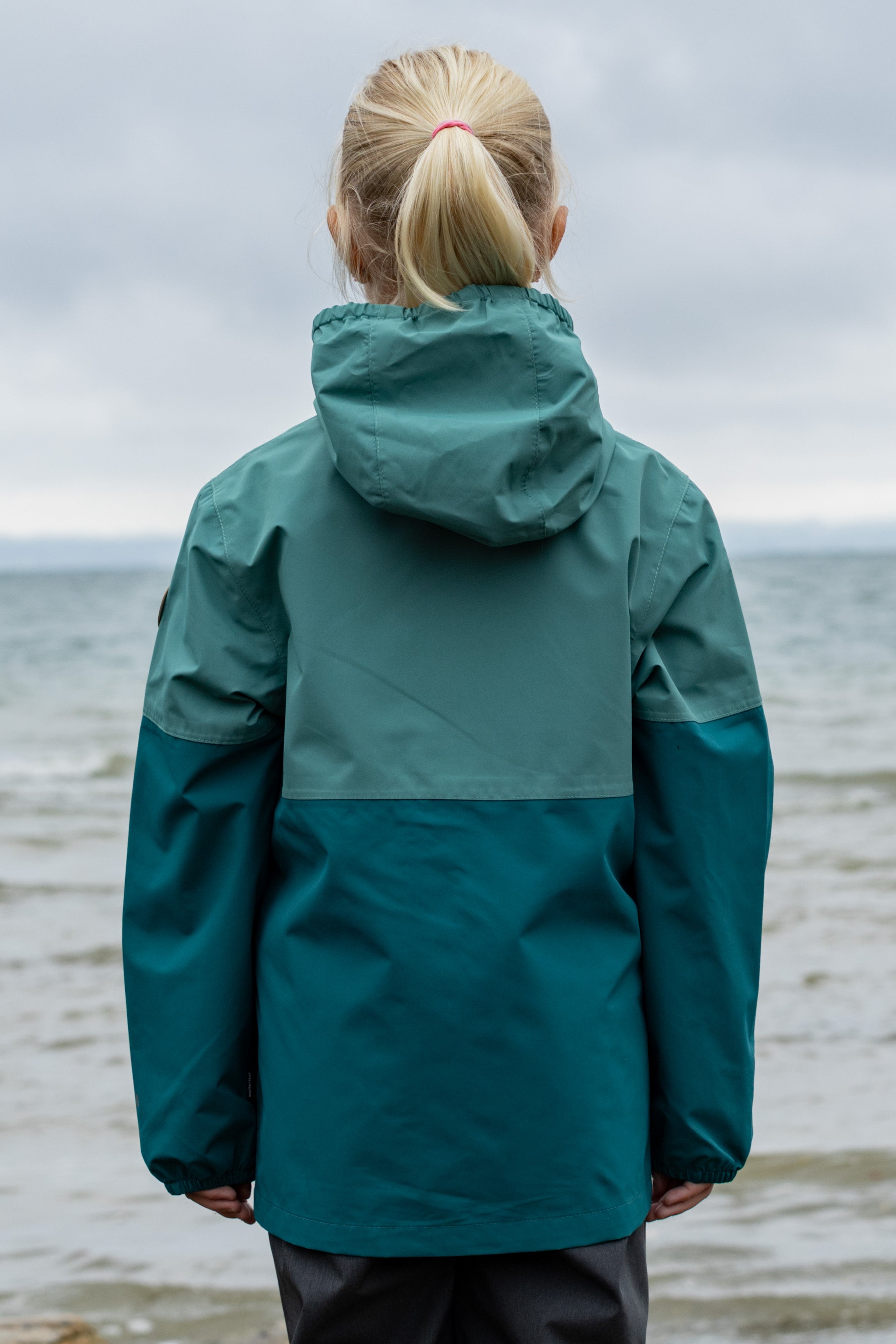 Travellight children's rain jacket deep sea