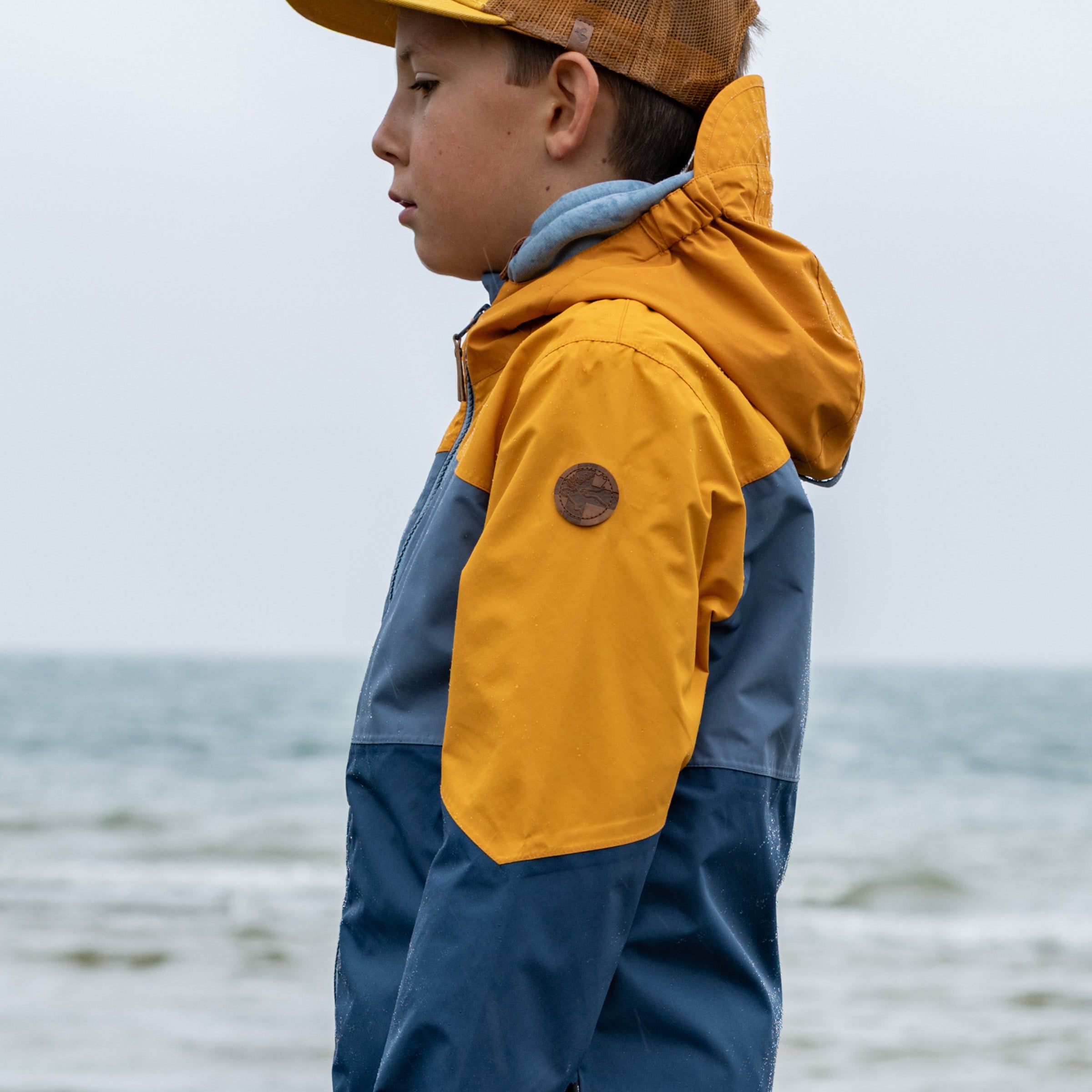 Wynn children's rain jacket inca gold