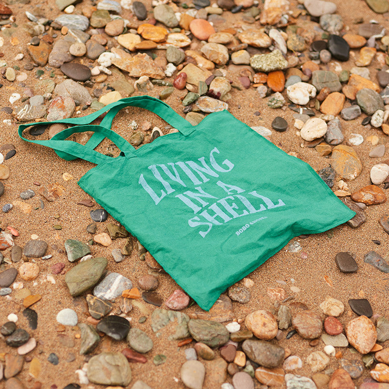 Living in a Shell green bag