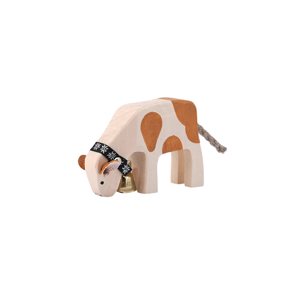 Trauffer Kalb fressend Simmentaler